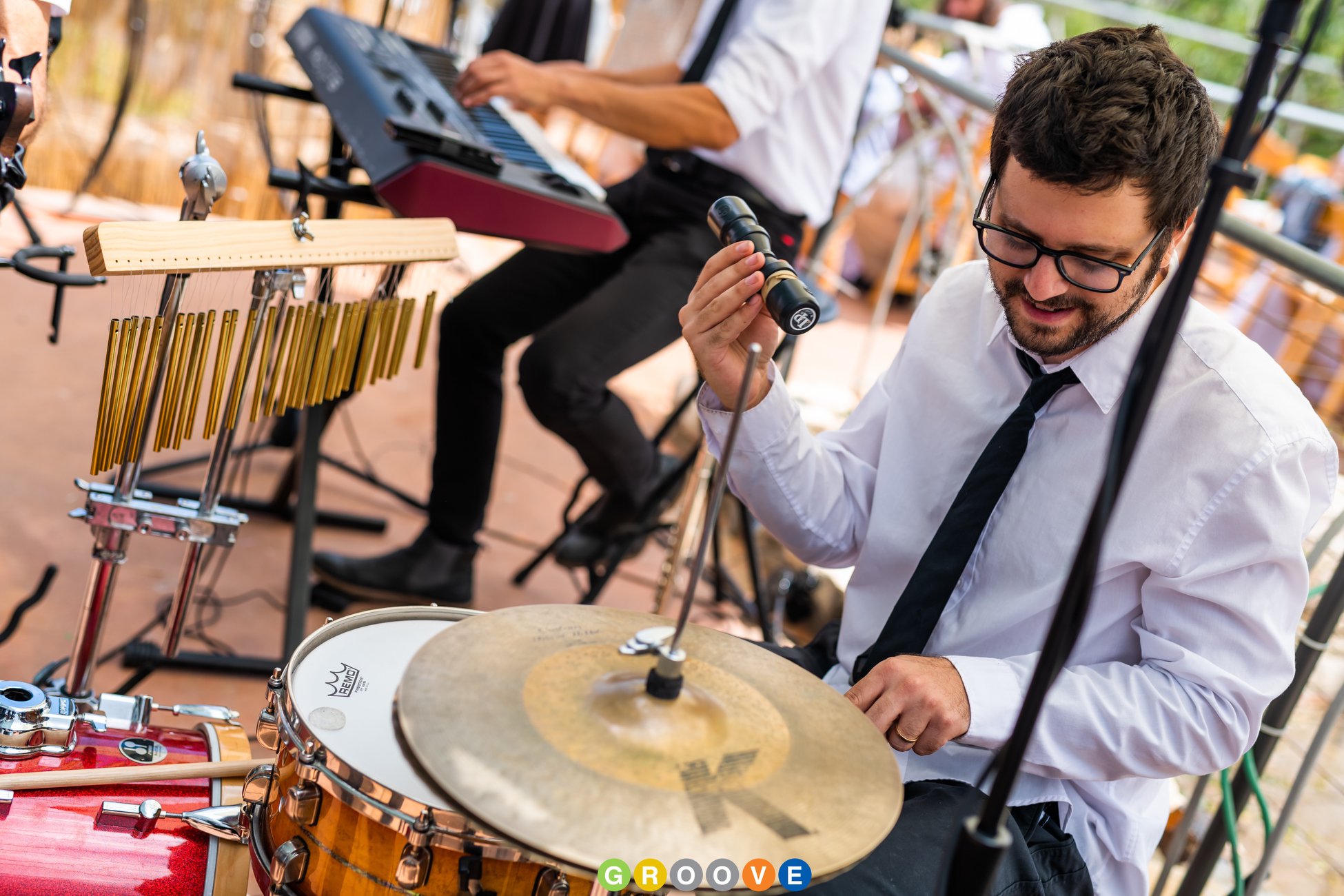Le batteur de Groove lors d'un cocktail